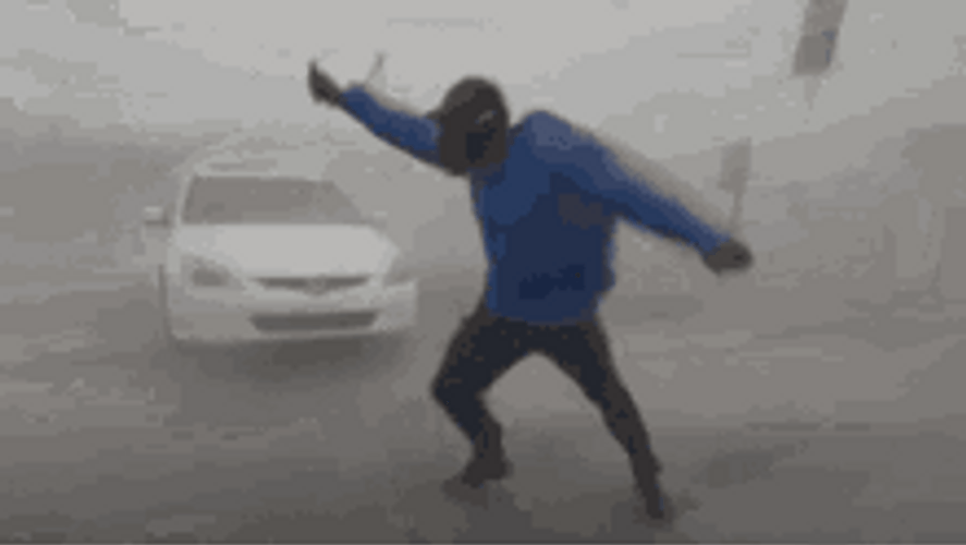 Funny Guy Fightning The Storm GIF
