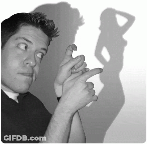 Funny Guy Playing With Shadow GIF