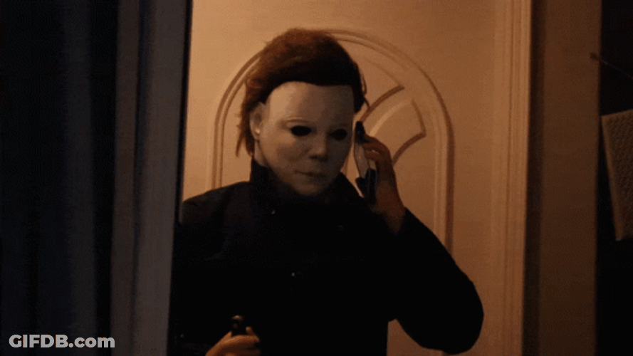 Funny Halloween Killer Calling Nodding GIF