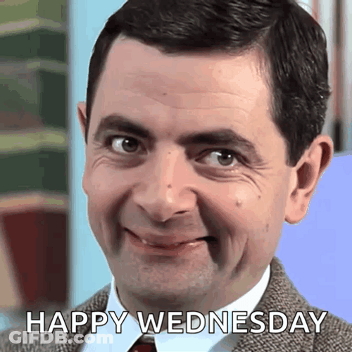 Funny Happy Wednesday Rowan Atkinson Smirking GIF