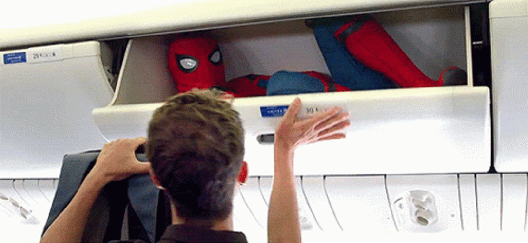 Funny How Spiderman Got Stuck On Plane Luggage Compartment GIF