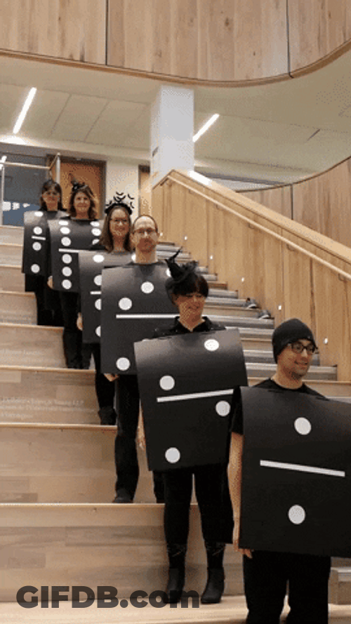 Funny Human Black Dominos Falling GIF
