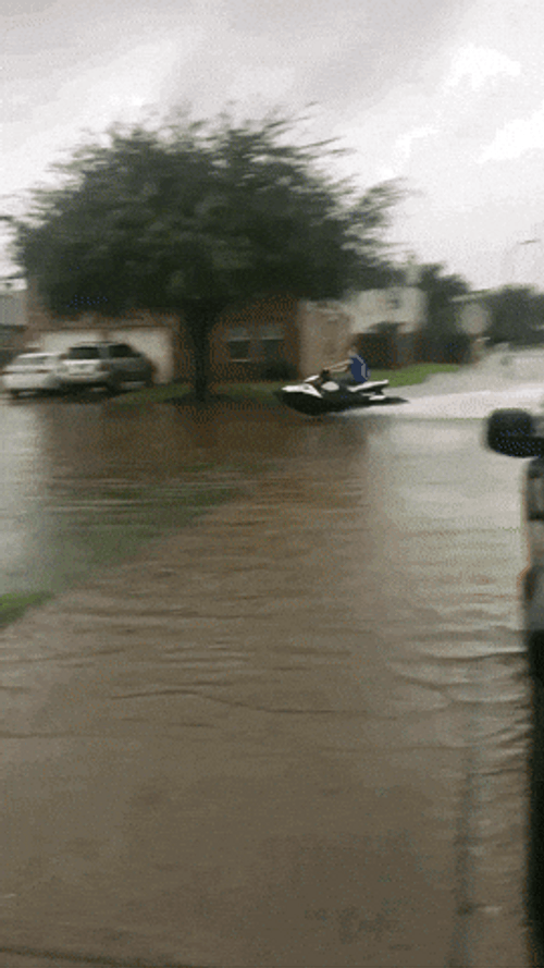 Funny Jet Ski Speeding Up In Monsoon Flood GIF