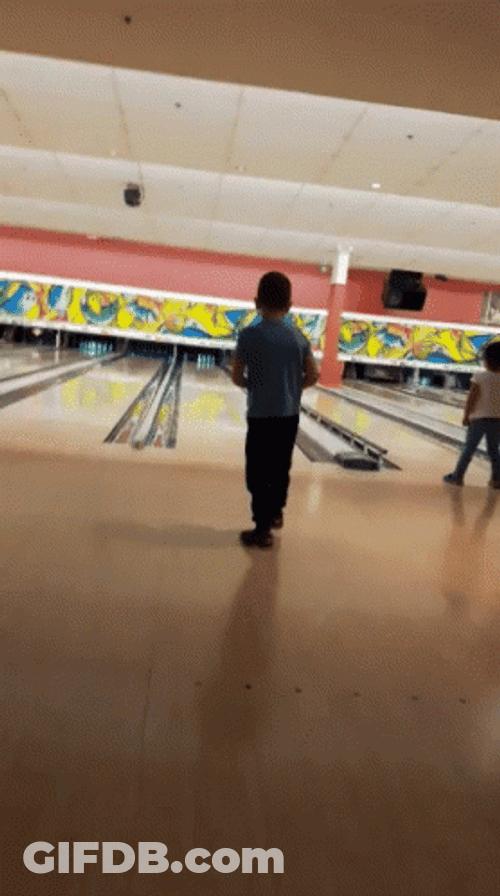 Funny Kid Double Hand Bowling Mishap GIF