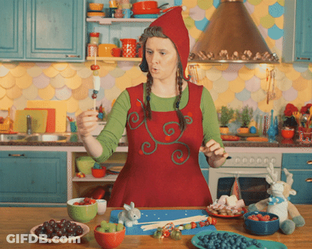Funny Lady Santa Baking GIF