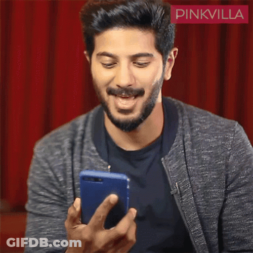 Funny Laughing Dulquer Salmaan Watching Online Videos GIF