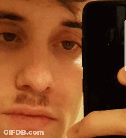 Funny Man Donning Hitler Mustache GIF