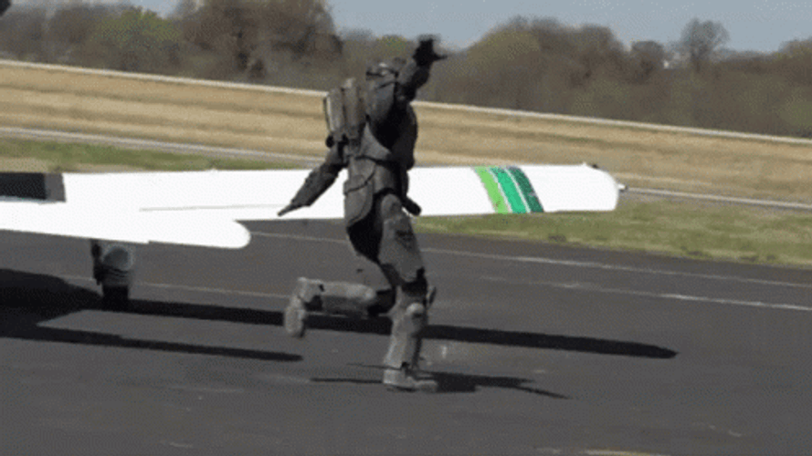 Funny Man Spreading His Arms Like Plane Running GIF
