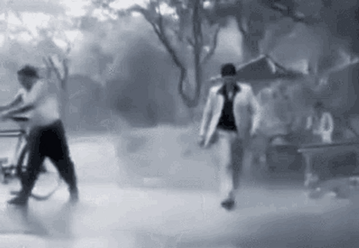 Funny Rain Man Playing GIF