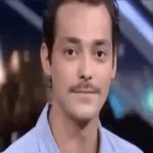 Funny Smile Guy Holding Laughter GIF