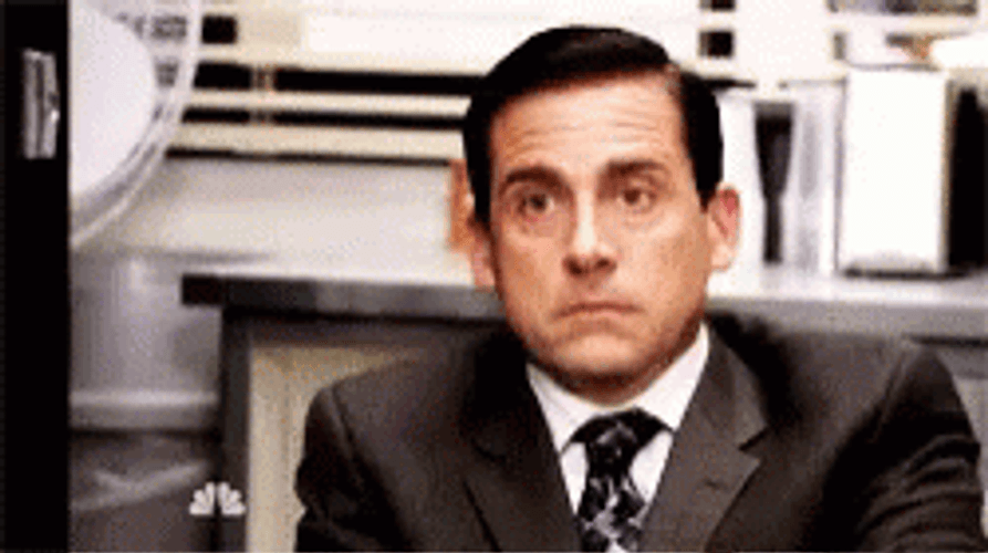 Funny Steve Carell Face Pretending To Work GIF