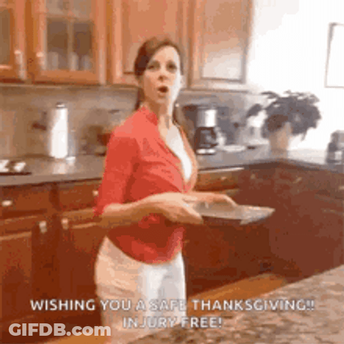 Funny Thanksgiving Woman Stumbling In The Kitchen GIF
