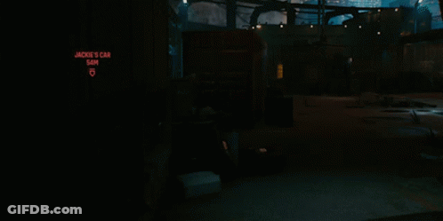 Futuristic City At Night With Coca-Cola Sign GIF