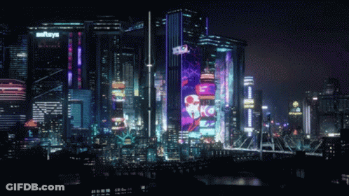 Futuristic City At Night With Saharas Building GIF
