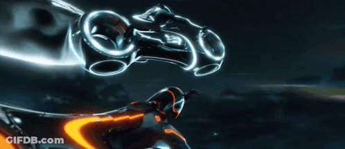 Futuristic Motorcycle Flying Through Dark Sky GIF