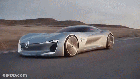Futuristic Silver Sports Car Driving Down Road GIF