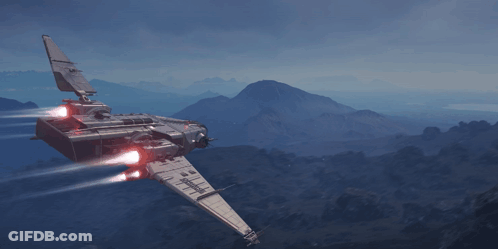 Futuristic Space Ship Flying Over Mountain Range GIF