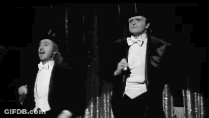 Galician Freaky Film Festival Two Men In Tuxedos GIF