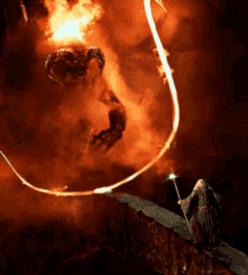 Gandalf Fighting A Monstrous Demon GIF