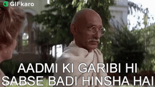 Gandhi In Garden With Glasses Talking To Woman GIF
