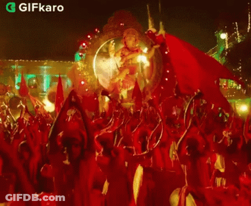 Ganesha Statue Surrounded By Crowd GIF
