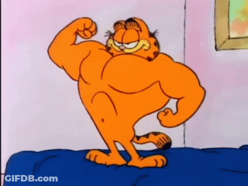 Garfield Is Flexing His Muscles On A Bed . GIF