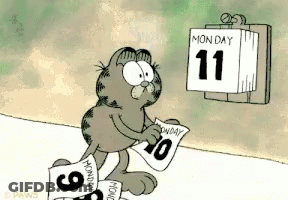 Garfield Is Looking At A Calendar That Says Monday On It GIF