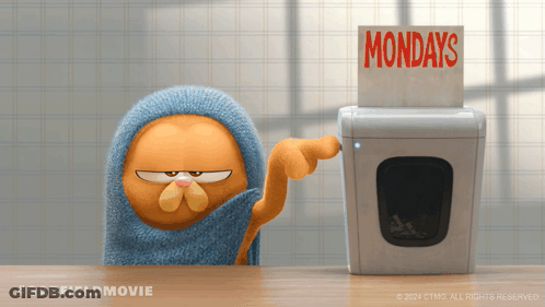 Garfield Is Pointing At A Washing Machine That Says Mondays GIF