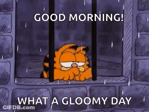 Garfield Is Sitting In A Prison Cell Looking Out The Window . GIF