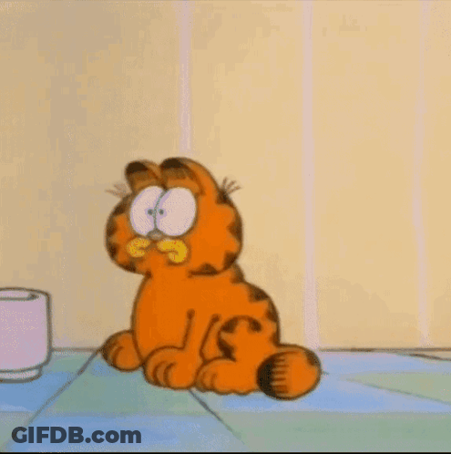 Garfield The Cat Is Sitting On A Tiled Floor Next To A Cup Of Coffee . GIF