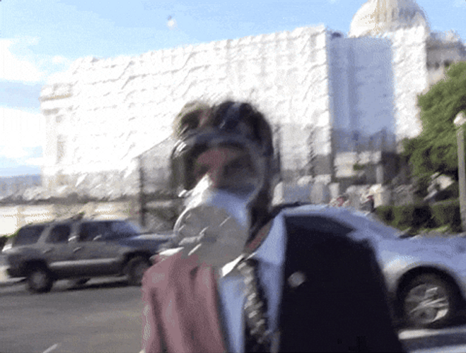 Gas Mask Man In Formal Attire GIF