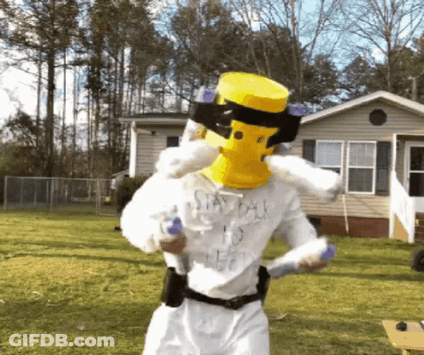 Gas Mask Man Spray Against Toxins GIF