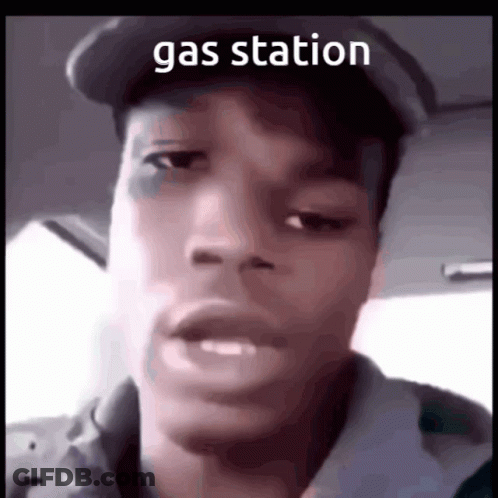 Gas Station Sign Above Man's Face GIF
