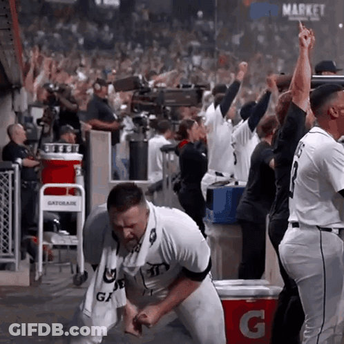 Gatorade Cooler Next To Baseball Player In Dugout GIF