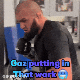 Gaz Putting In That Work Written On Man's Arm GIF