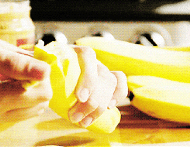 Gently Peeling Of Banana Meme GIF