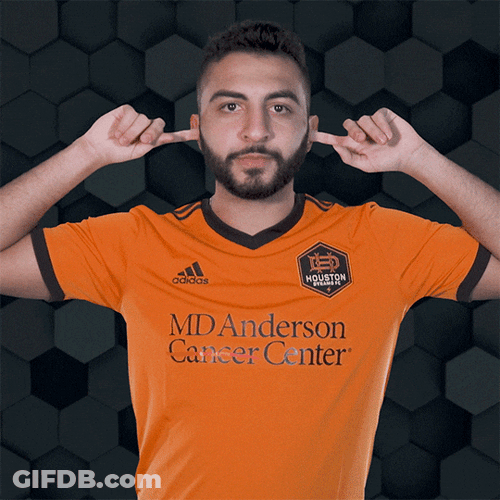 George Adamou Ear Plugs And Rock Sign For Pose GIF