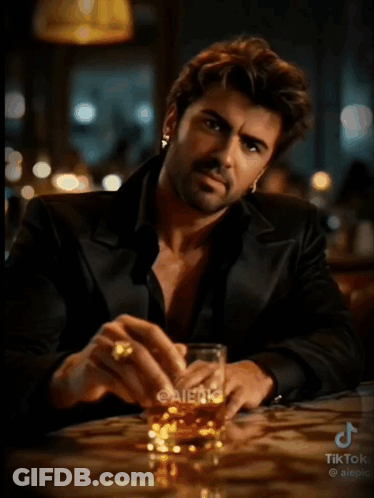 George Michael Burberry Sitting At Bar With Whiskey GIF