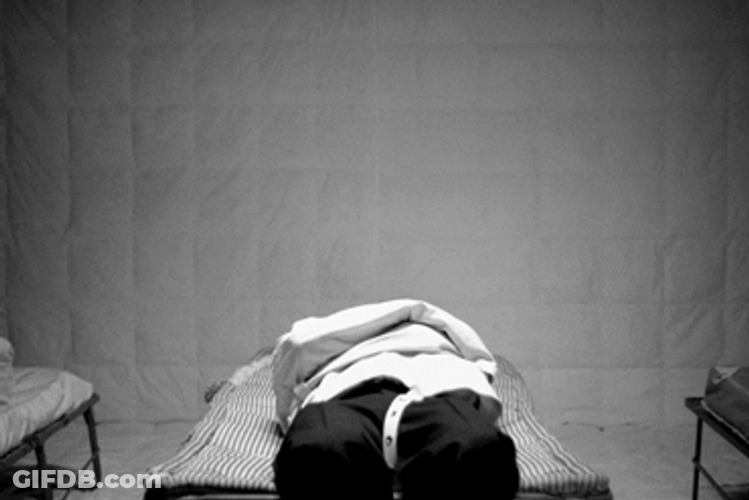 Getting Up Removing Straight Jacket GIF