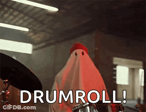 Ghost Standing In Front Of Drum Set Saying Drumroll GIF