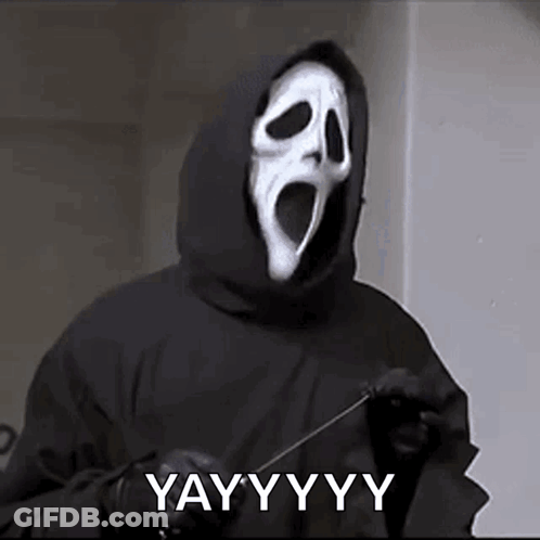 Ghostface In Black Hooded Jacket Holding Knife GIF