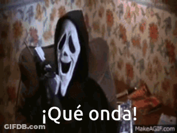 Ghostface Talking On Cell Phone In Chair GIF