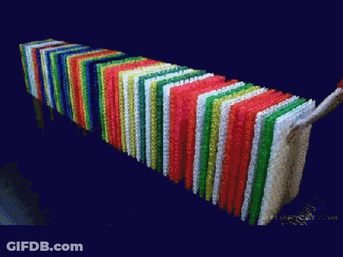 Giant Colorful Dominos Falling GIF