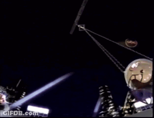 Giant Donut Thrown In Ring With TNTFS Sign GIF