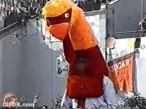 Giant Inflatable Chicken In Front Of Sugar Sign GIF