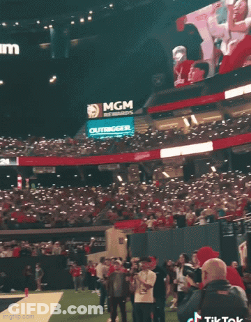 Giant Stadium With MGM Rewards And Outtrigger Signs GIF