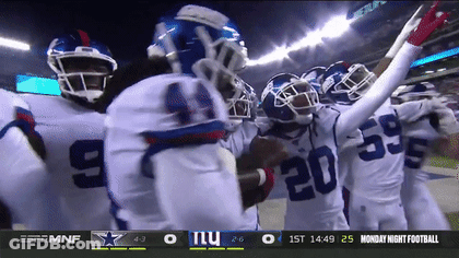 Giants Football Players Huddled Together GIF