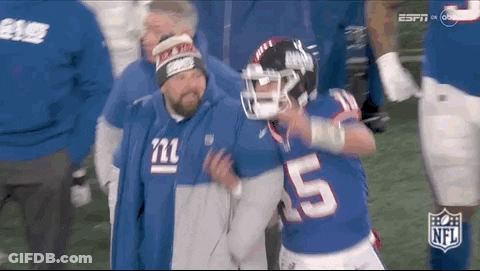 Giants Player Helped Off Field By Man In Giants Hat GIF