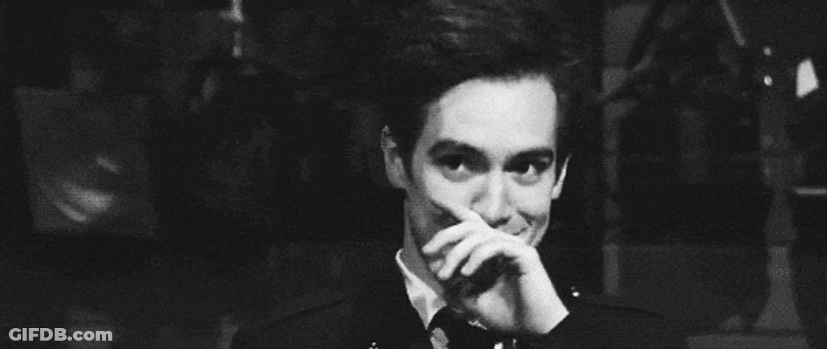 Giggle Handsome Guy Covering Laughter GIF