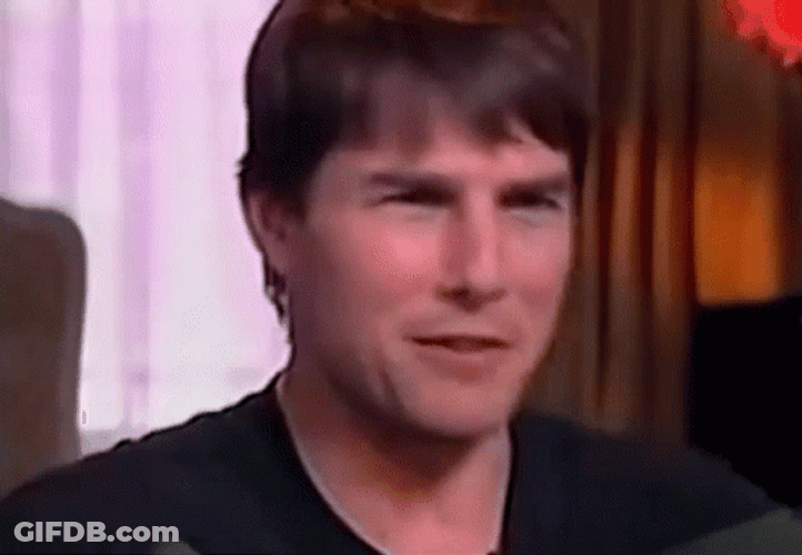 Giggling Tom Cruise Laughing Hard GIF